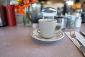 Cup of coffee on table